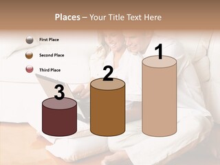 Young Love Couple Smiling In The Comfortable Apartment PowerPoint Template
