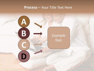 Young Love Couple Smiling In The Comfortable Apartment PowerPoint Template