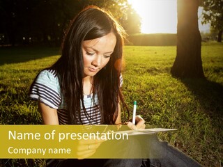 Beautiful Young Woman Writing Outdoors In A Park At Sunset PowerPoint Template