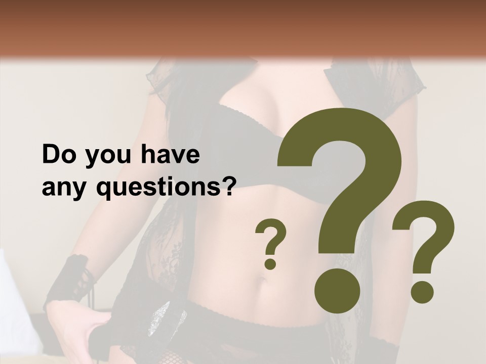 A Woman In Lingerie Posing On A Bed PowerPoint Template