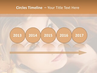A Beautiful Blond Woman With Blue Eyes Is Posing For A Picture PowerPoint Template