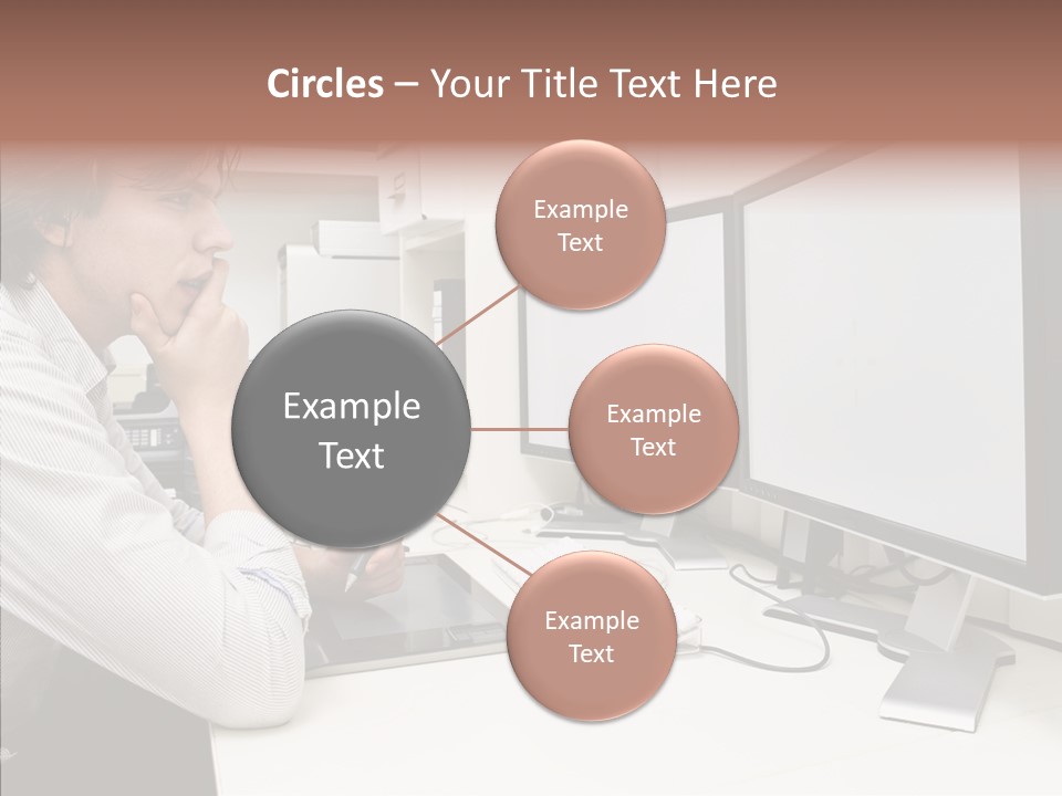 A Man Sitting At A Desk With A Computer PowerPoint Template
