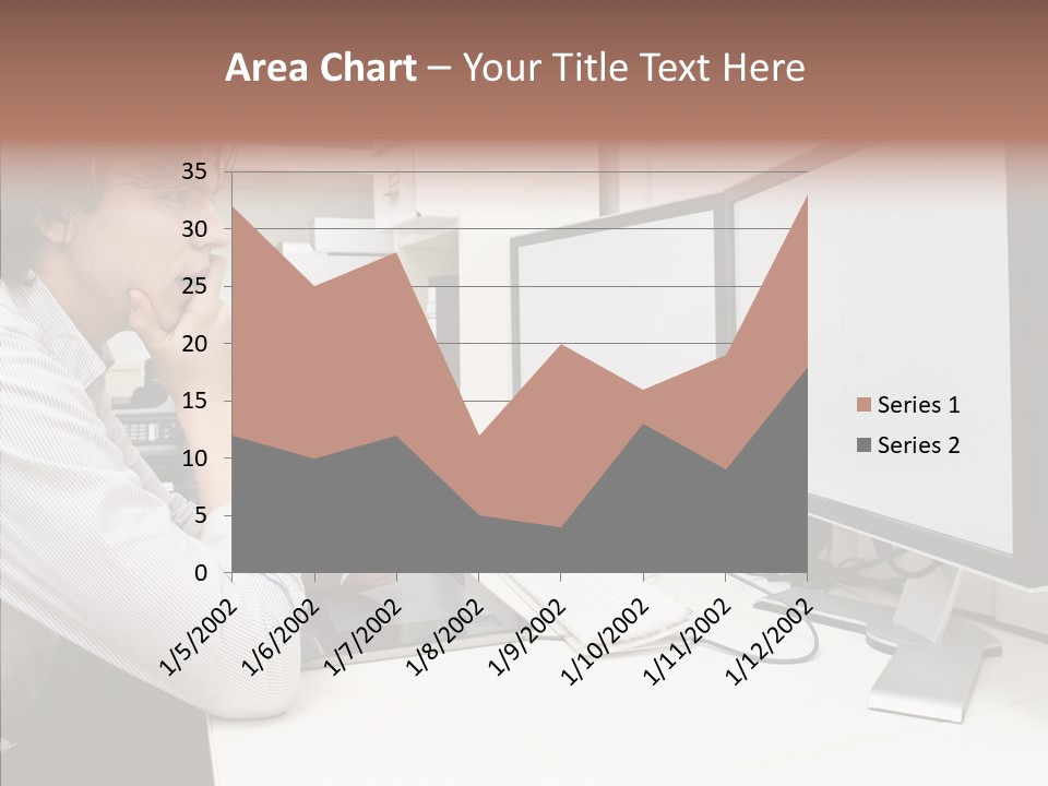 A Man Sitting At A Desk With A Computer PowerPoint Template