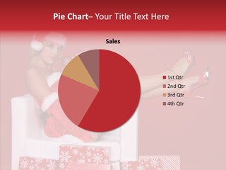 A Woman In A Santa Claus Outfit Sitting On A Chair PowerPoint Template