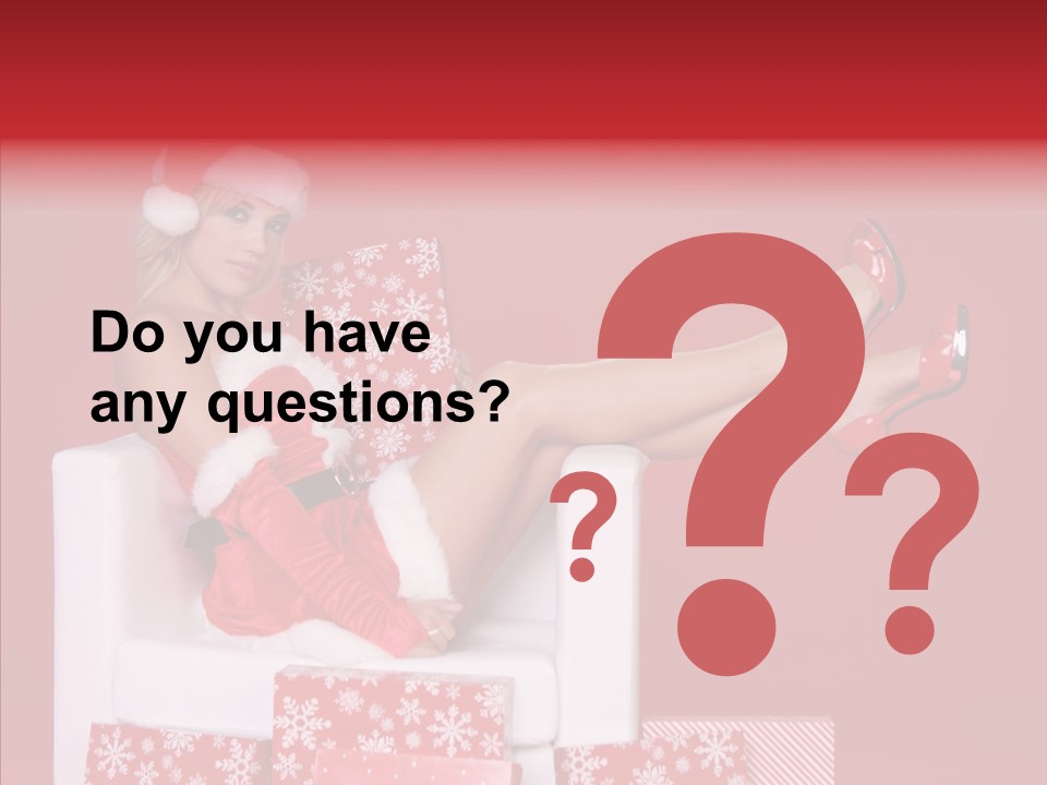 A Woman In A Santa Claus Outfit Sitting On A Chair PowerPoint Template