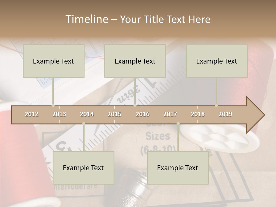 Two Spools Of Thread Sitting On Top Of A Piece Of Paper PowerPoint Template