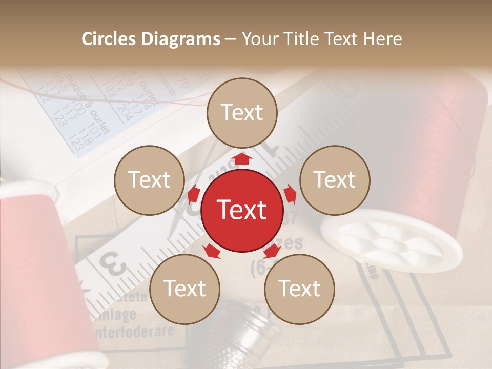 Two Spools Of Thread Sitting On Top Of A Piece Of Paper PowerPoint Template