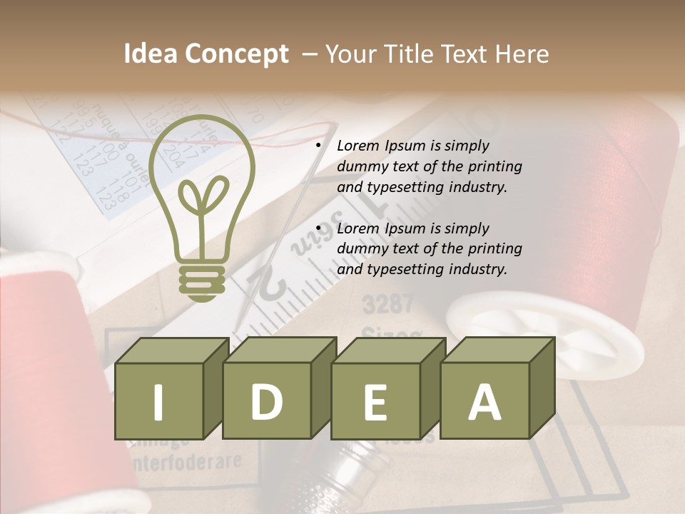 Two Spools Of Thread Sitting On Top Of A Piece Of Paper PowerPoint Template