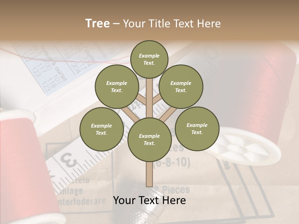 Two Spools Of Thread Sitting On Top Of A Piece Of Paper PowerPoint Template
