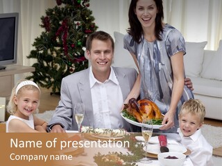 Family Celebrating Christmas PowerPoint Template