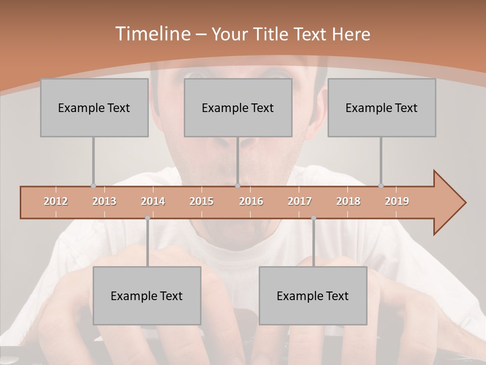 A Man With A Surprised Look On His Face Is Typing On A Keyboard PowerPoint Template