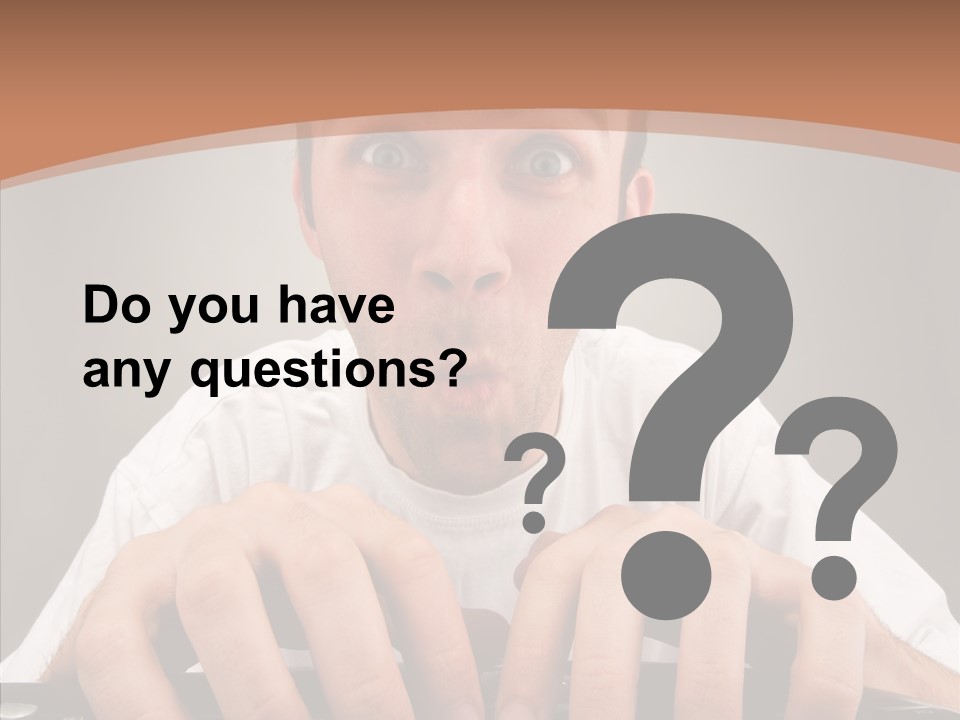 A Man With A Surprised Look On His Face Is Typing On A Keyboard PowerPoint Template