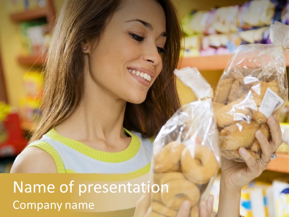 A Woman Holding A Bag Of Doughnuts In A Store PowerPoint Template
