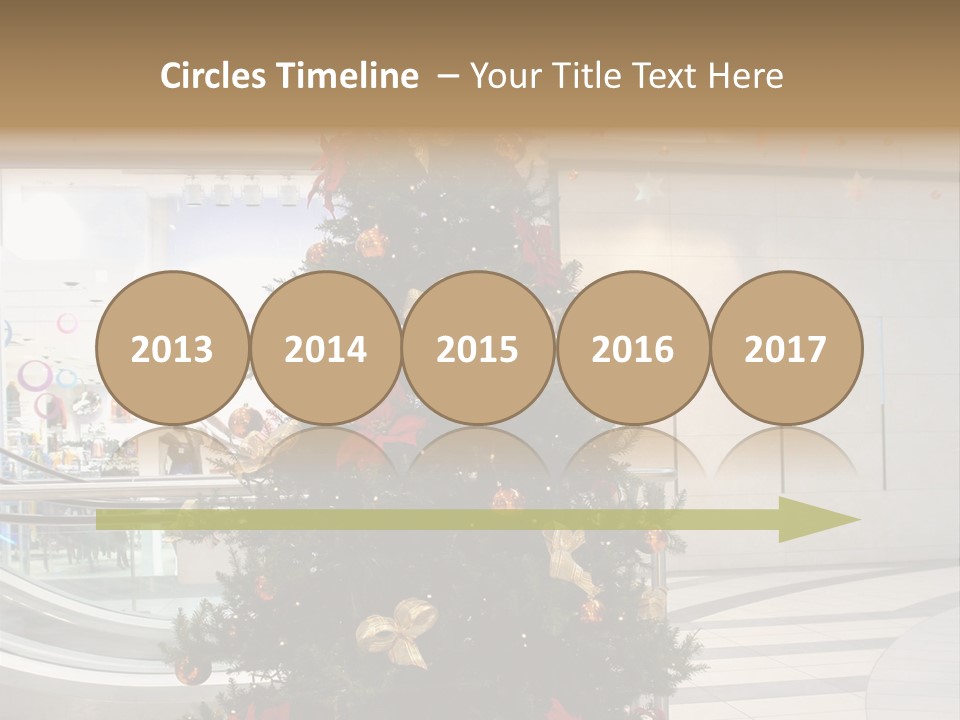 A Decorated Christmas Tree In A Shopping Mall PowerPoint Template