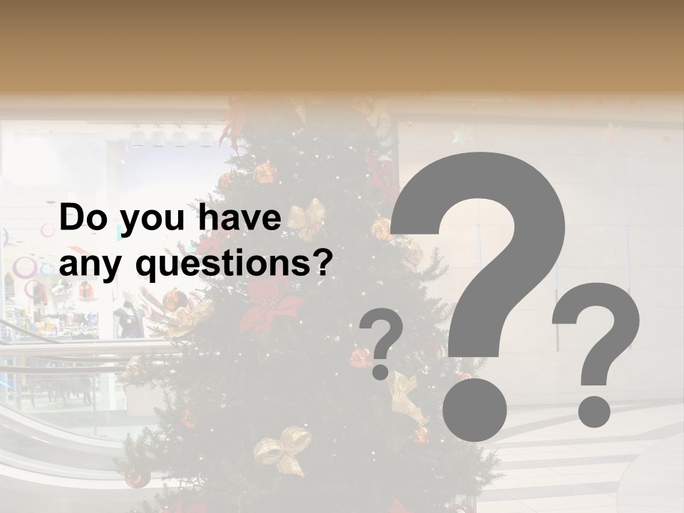 A Decorated Christmas Tree In A Shopping Mall PowerPoint Template