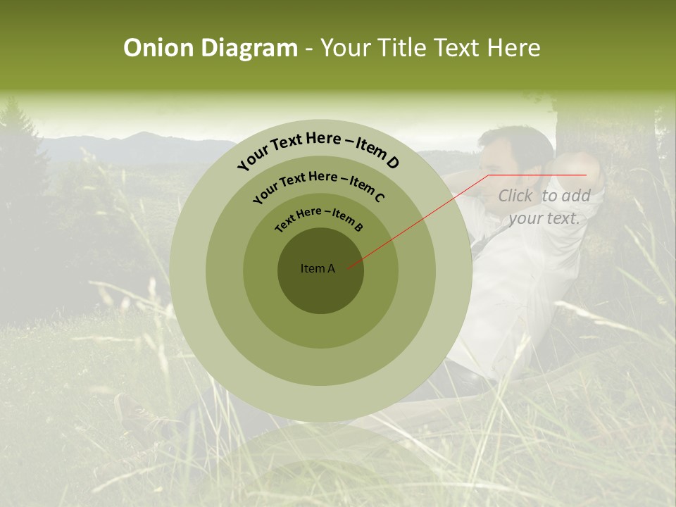 A Man Sitting In The Grass With A Laptop PowerPoint Template