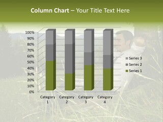 A Man Sitting In The Grass With A Laptop PowerPoint Template