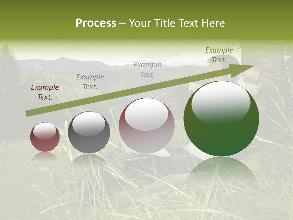 A Man Sitting In The Grass With A Laptop PowerPoint Template