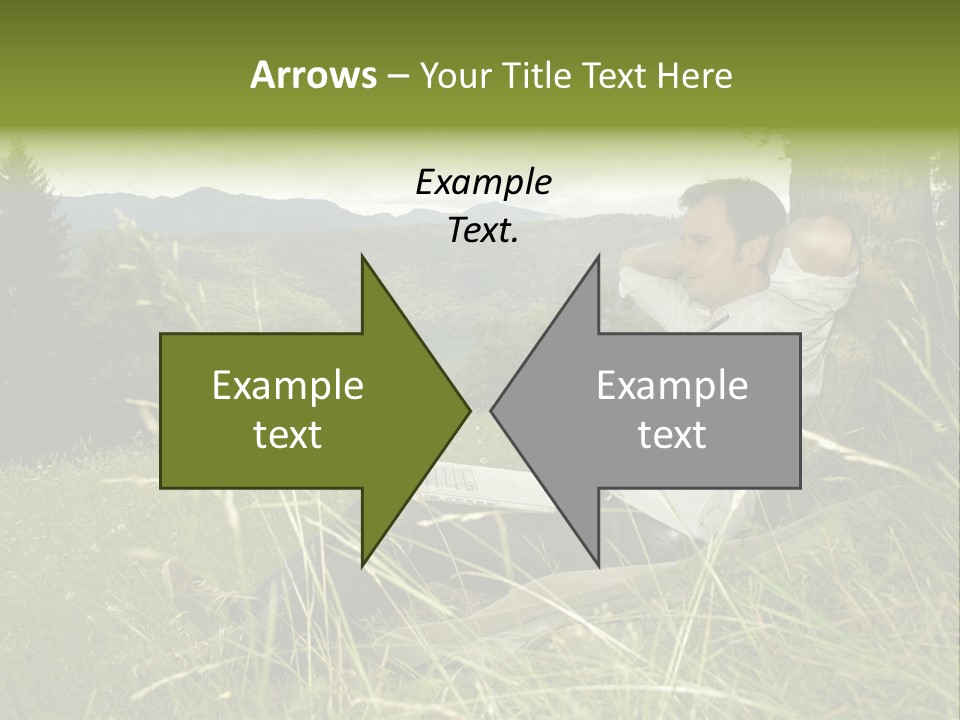 A Man Sitting In The Grass With A Laptop PowerPoint Template