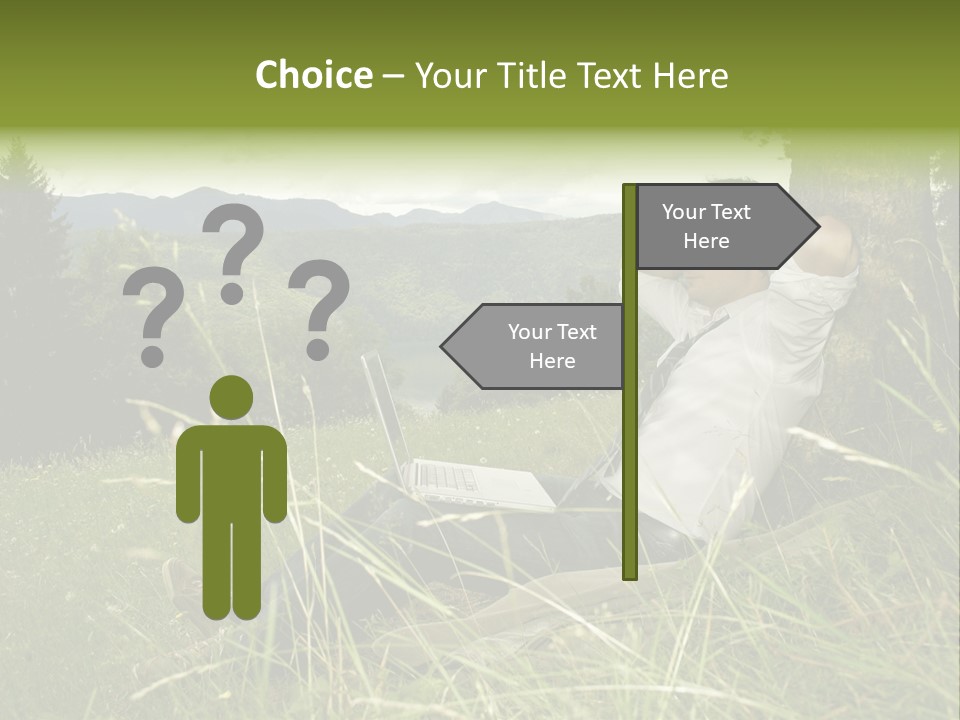 A Man Sitting In The Grass With A Laptop PowerPoint Template