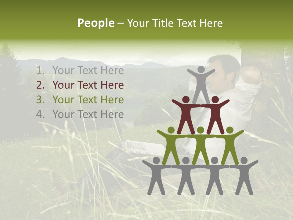 A Man Sitting In The Grass With A Laptop PowerPoint Template
