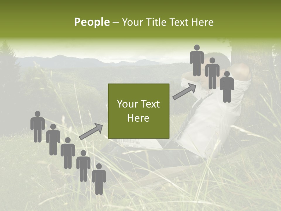 A Man Sitting In The Grass With A Laptop PowerPoint Template