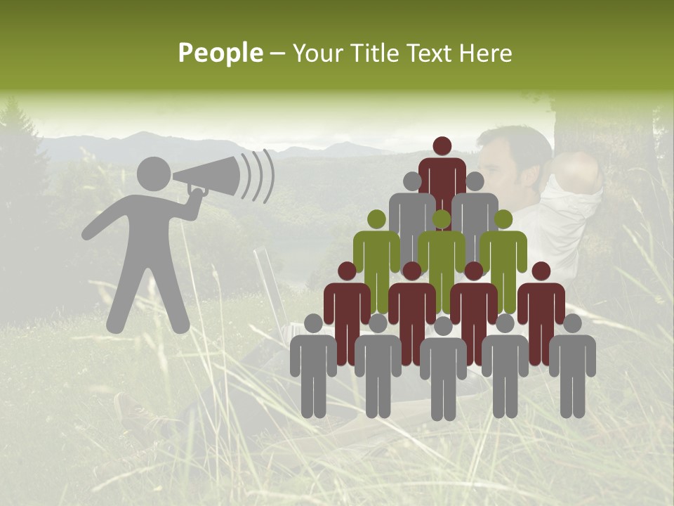 A Man Sitting In The Grass With A Laptop PowerPoint Template