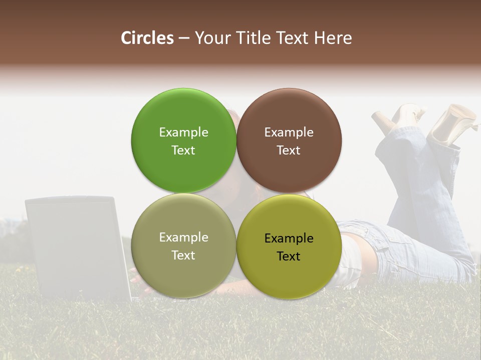 A Woman Laying On The Grass Using A Laptop PowerPoint Template
