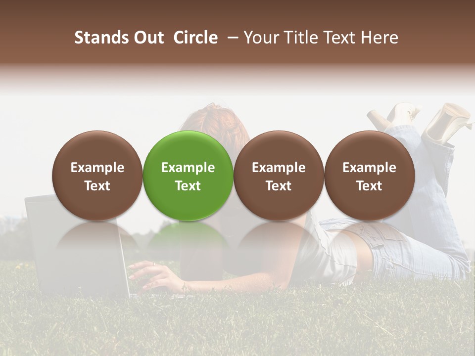 A Woman Laying On The Grass Using A Laptop PowerPoint Template