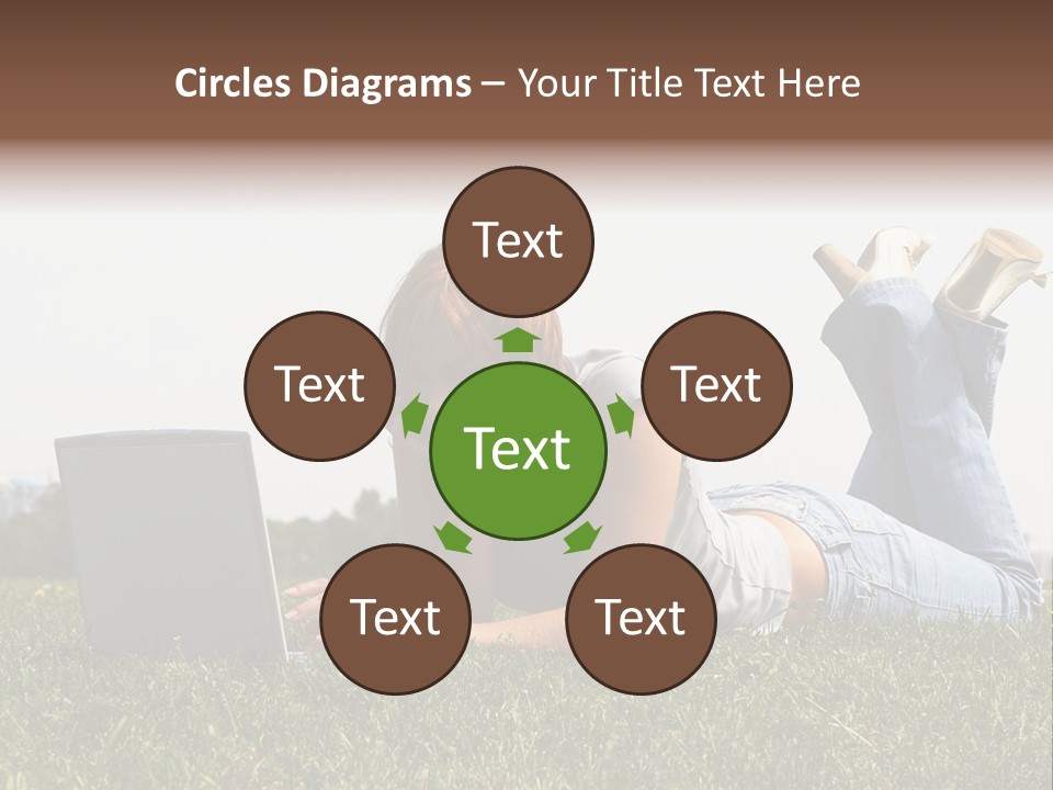 A Woman Laying On The Grass Using A Laptop PowerPoint Template