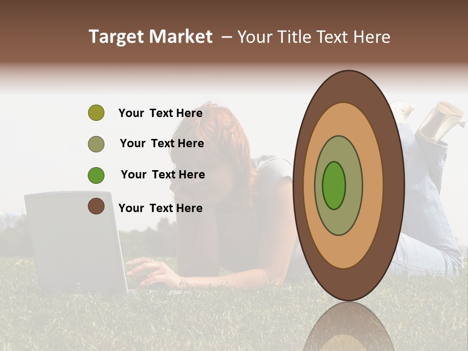 A Woman Laying On The Grass Using A Laptop PowerPoint Template