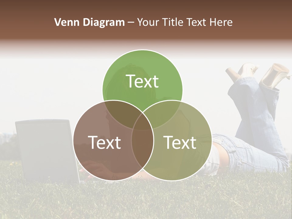 A Woman Laying On The Grass Using A Laptop PowerPoint Template