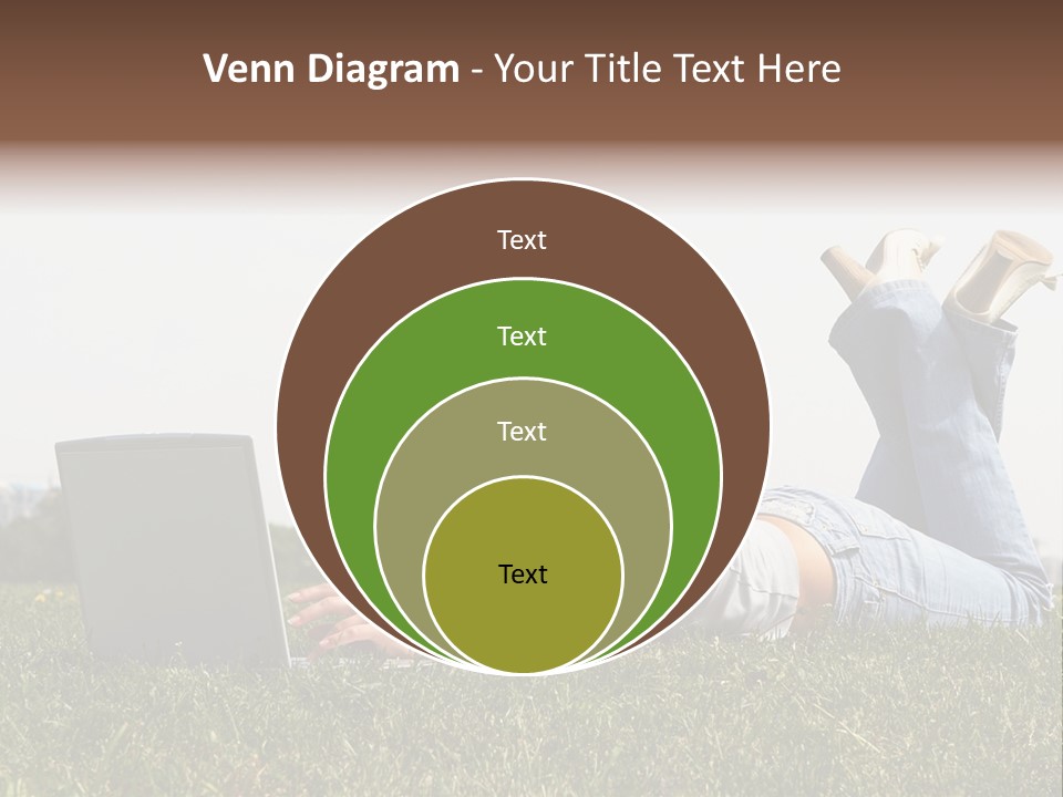 A Woman Laying On The Grass Using A Laptop PowerPoint Template