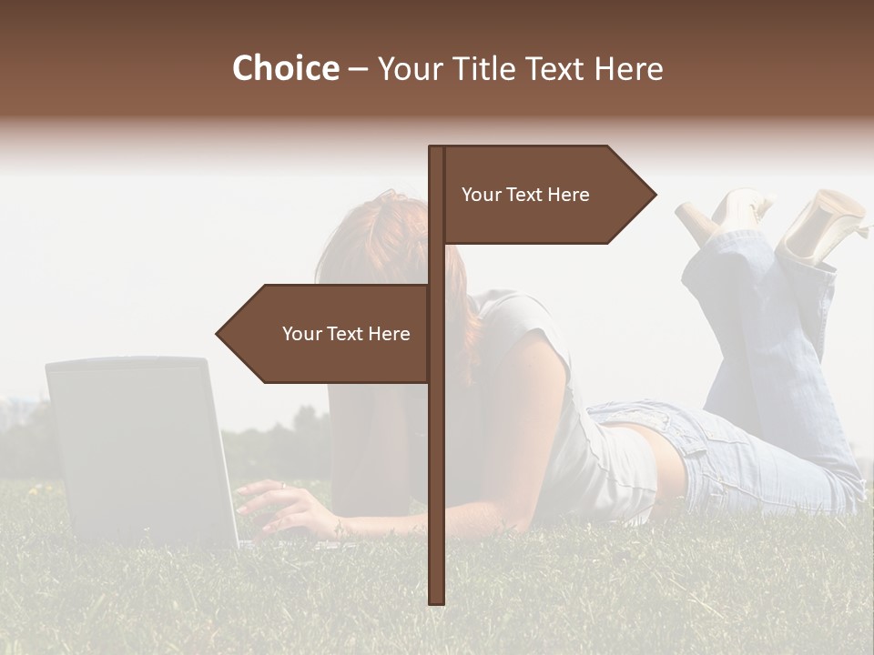 A Woman Laying On The Grass Using A Laptop PowerPoint Template