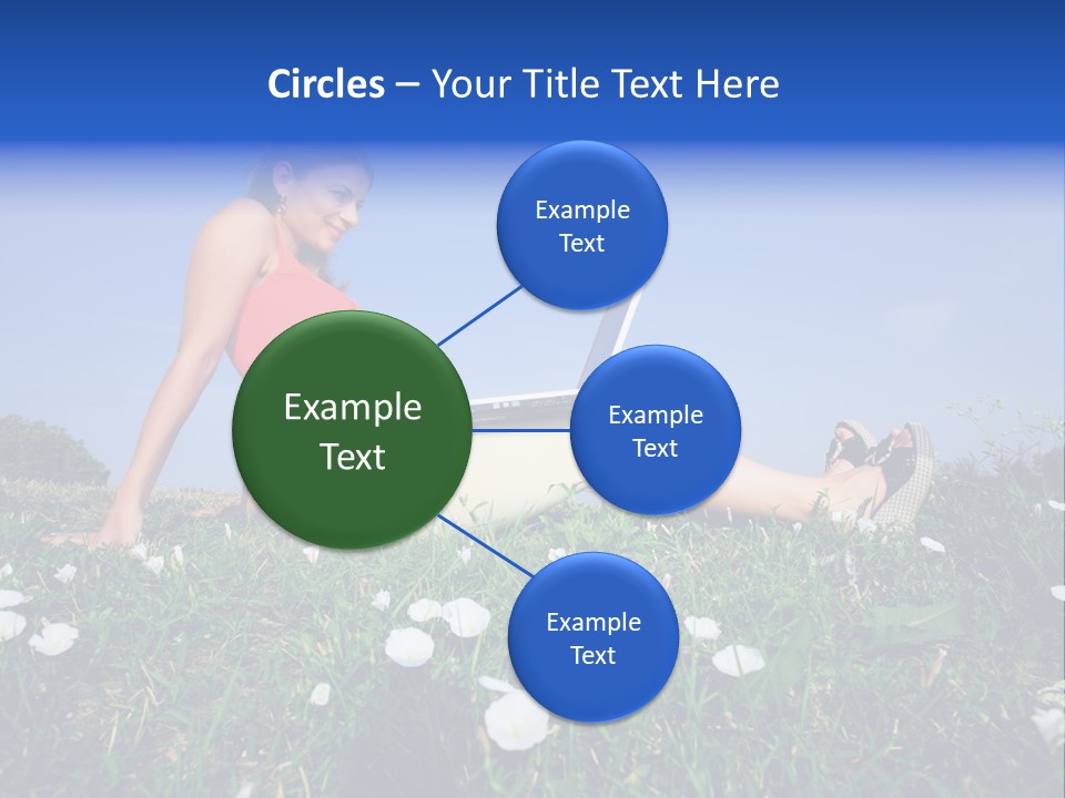 A Woman Laying On The Grass With A Laptop PowerPoint Template