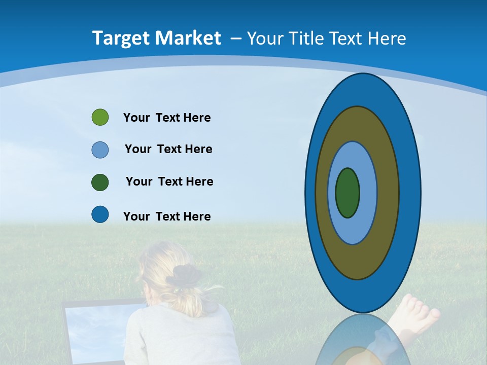 A Woman Laying In The Grass With A Laptop On Her Lap PowerPoint Template