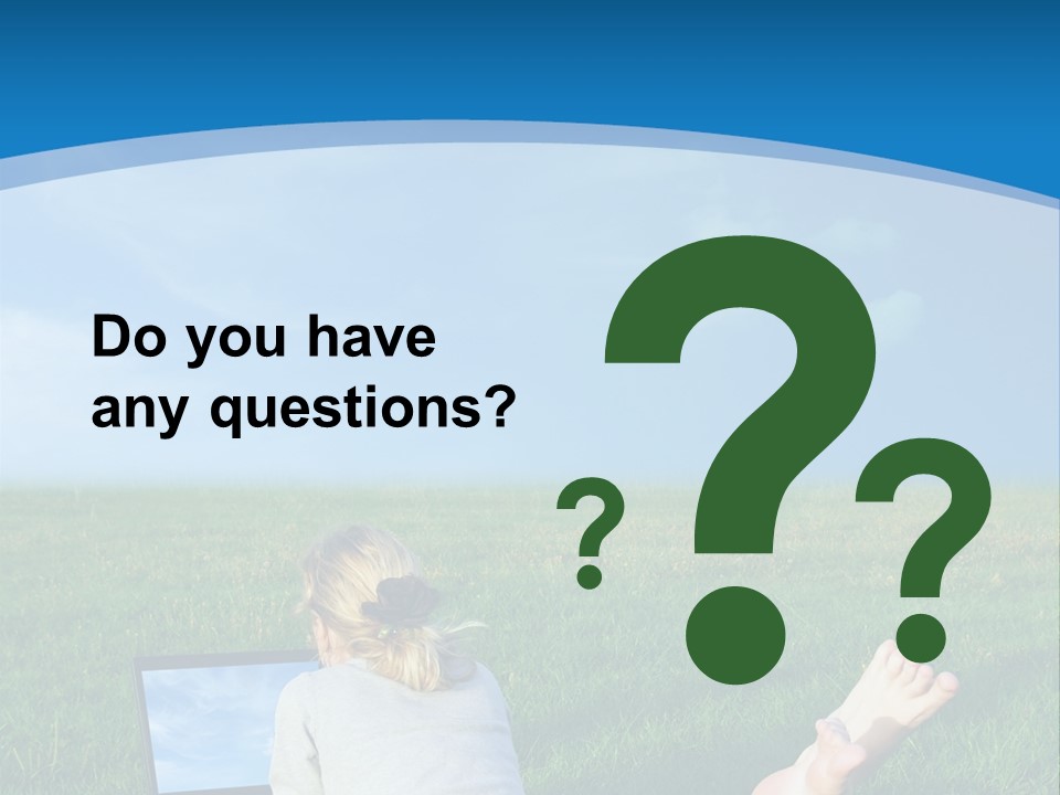 A Woman Laying In The Grass With A Laptop On Her Lap PowerPoint Template