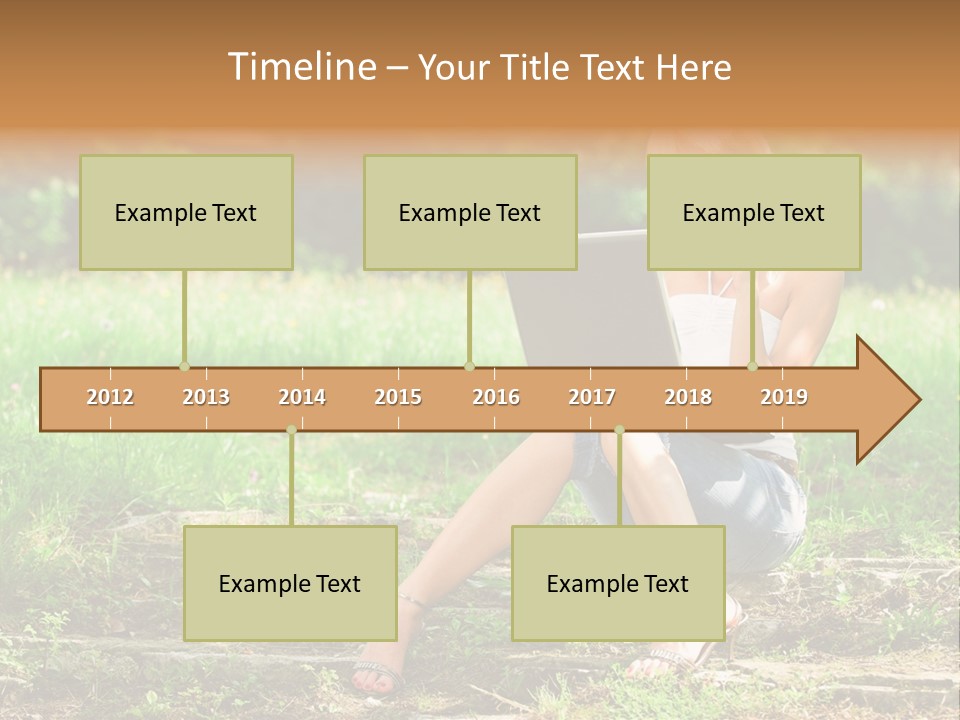 A Woman Sitting In The Grass Using A Laptop Computer PowerPoint Template
