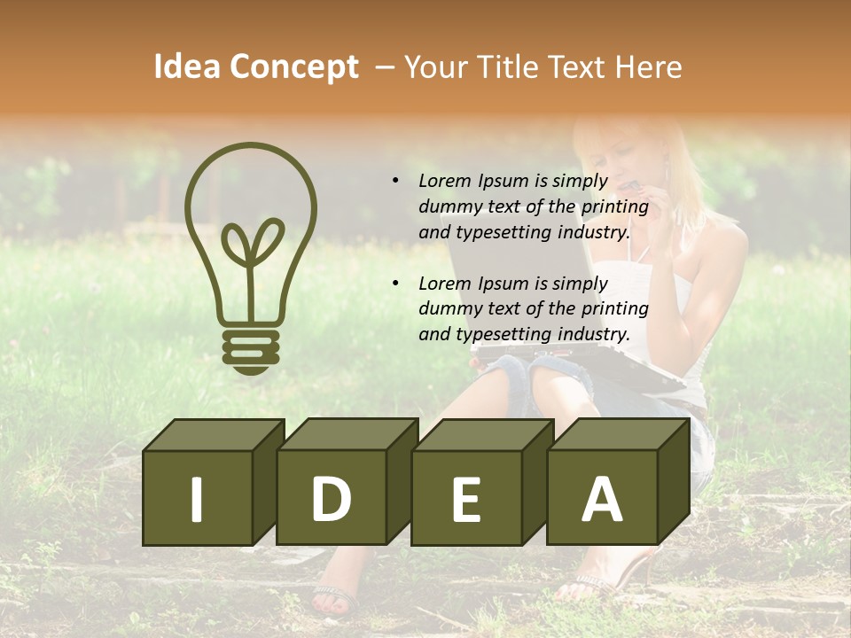 A Woman Sitting In The Grass Using A Laptop Computer PowerPoint Template