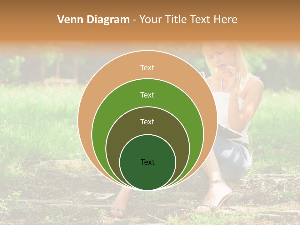 A Woman Sitting In The Grass Using A Laptop Computer PowerPoint Template