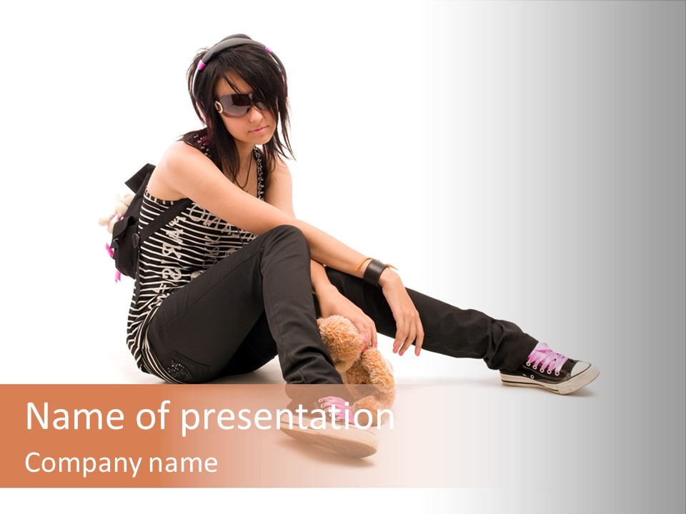 A Woman Sitting On The Floor With A Teddy Bear PowerPoint Template