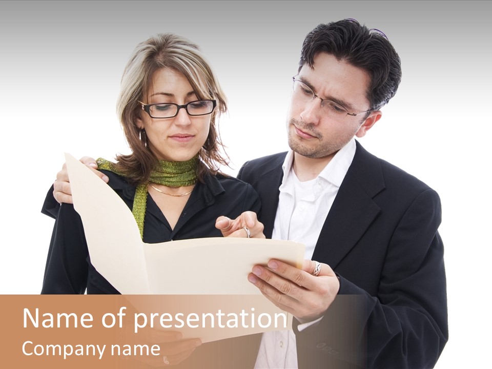 A Man And Woman Looking At A Piece Of Paper PowerPoint Template