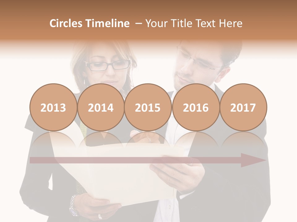 A Man And Woman Looking At A Piece Of Paper PowerPoint Template