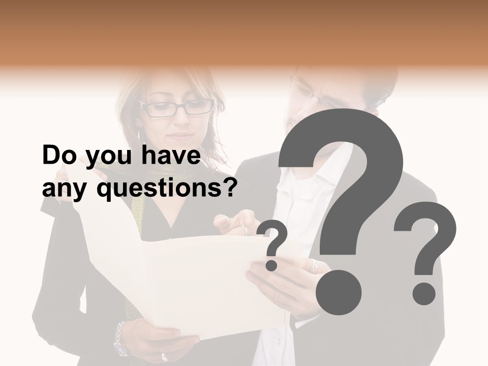 A Man And Woman Looking At A Piece Of Paper PowerPoint Template