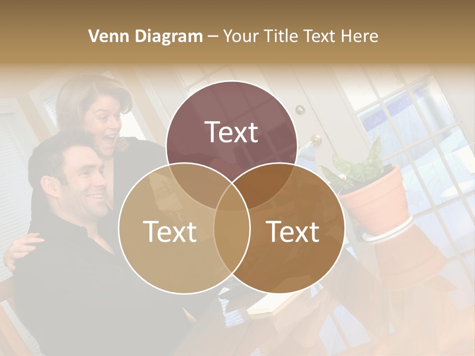 A Man And Woman Sitting At A Table With A Laptop PowerPoint Template