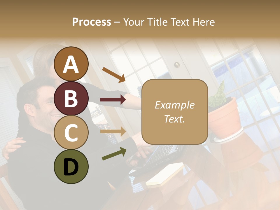 A Man And Woman Sitting At A Table With A Laptop PowerPoint Template