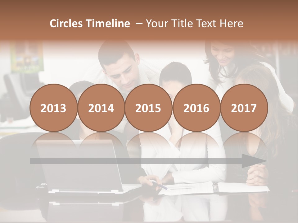 A Group Of People Looking At A Laptop PowerPoint Template