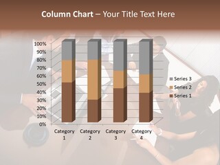 A Group Of People Sitting Around A Conference Table PowerPoint Template