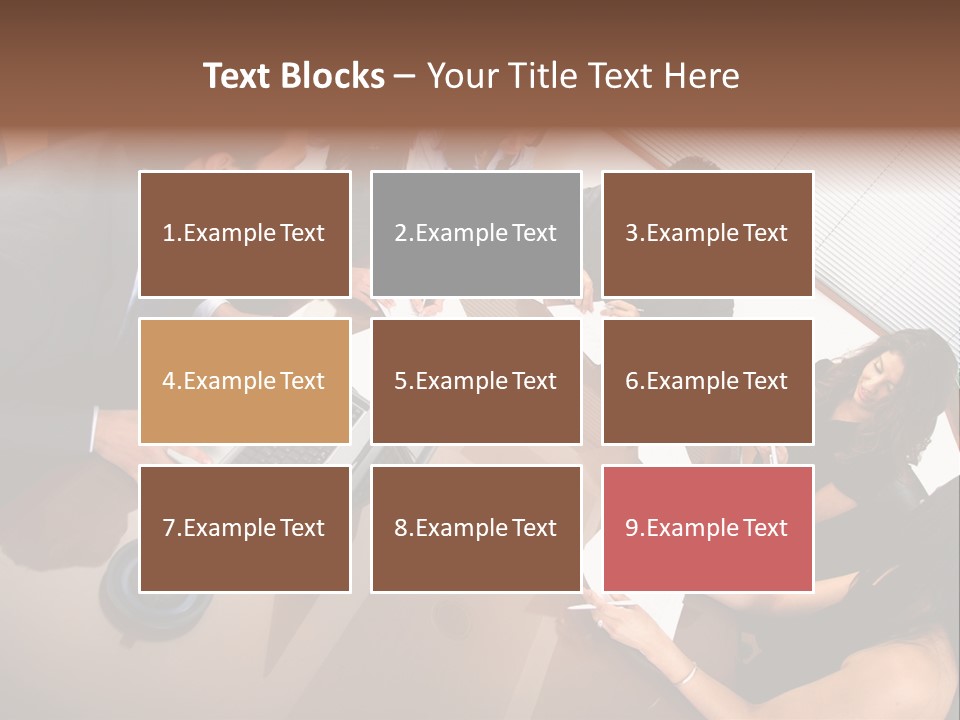 A Group Of People Sitting Around A Conference Table PowerPoint Template