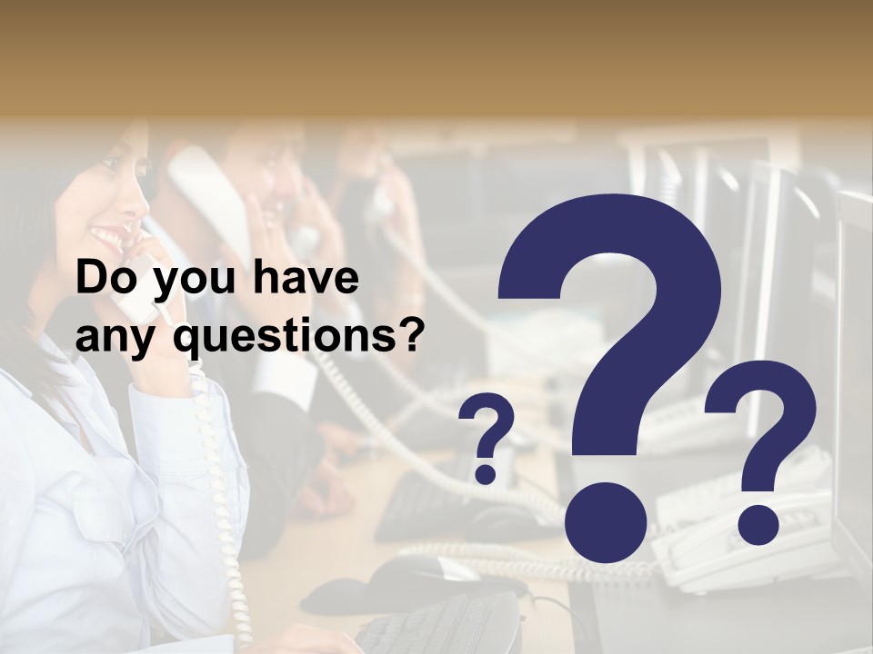 A Group Of People Sitting At A Desk Talking On Telephones PowerPoint Template